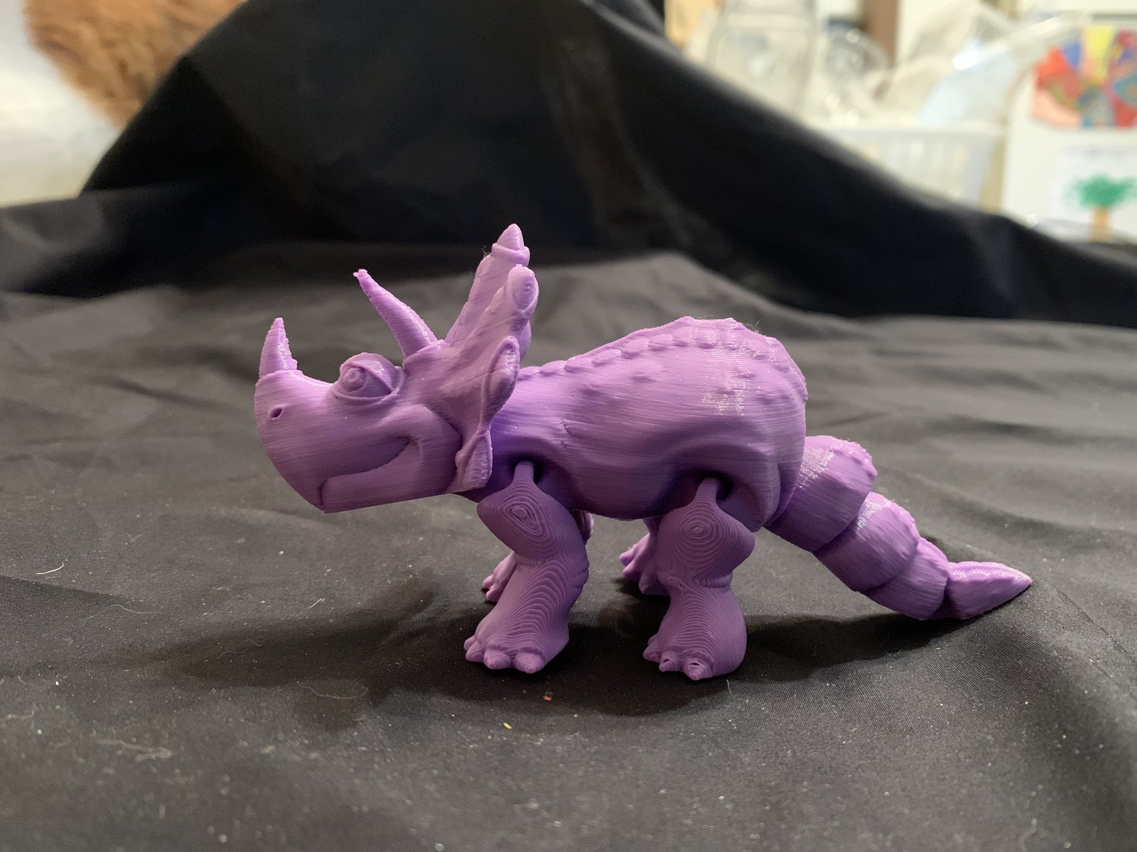 3D printed purple articulated triceratops dinosaur